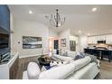 Spacious living area featuring stylish decor, an open layout, and abundant natural light at 6229 Sw 95Th Pl, Ocala, FL 34476