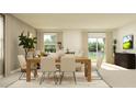 Open-concept living and dining area with large windows and neutral decor at 1292 Blue Ash Ln, Deland, FL 32720