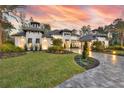 Beautifully landscaped front yard and a gorgeous house with great architectural details at 1829 Adrian Creek Blvd, Port Orange, FL 32128