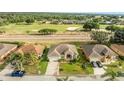 An aerial view of the home showcasing its location within a golf course community at 2522 Pine Valley Dr, Lakeland, FL 33810