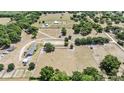 Picturesque horse farm with riding arena and fencing at 25601 Hutcheson Ln, Sorrento, FL 32776