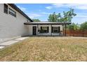 Charming front porch with stylish accents, offering a welcoming entrance to the home at 1352 Charlotte St, Altamonte Springs, FL 32701