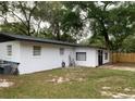 Spacious backyard with partial fence is ready for outdoor enjoyment and entertaining at 3601 Ne 24Th Ct, Ocala, FL 34479