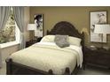 Comfortable bedroom with a large bed, decorative pillows, neutral color scheme, and artwork above the bed at 1864 Bright Sky Dr, Kissimmee, FL 34744