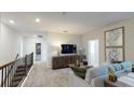 Cozy upstairs loft area with comfortable seating and stylish decor at 1911 Clear Sky Dr, Kissimmee, FL 34744