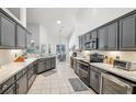 Beautiful kitchen featuring stainless steel appliances and stone countertops at 917 Keep Way Loop, Oviedo, FL 32765