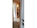 Hallway featuring tile flooring and neutral paint at 2605 Gala S Rd, Kissimmee, FL 34746