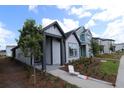 Inviting single-Gathering home with eye-catching curb appeal, landscaping, and comfortable front porch at 3102 Voyager Ave, St Cloud, FL 34771