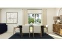 Elegant dining room with modern furnishings, natural light, and stylish decor at 3506 Kimbrough Dr, Lake Wales, FL 33859