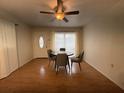 Bright dining area featuring hard wood floors, contemporary furnishings, and natural light at 2920 Sanka Dr, Orlando, FL 32826