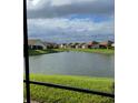 Scenic view of the calm water behind the house at 1415 Colonial Ct, Winter Haven, FL 33884