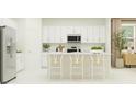 Bright, all-white kitchen featuring an island with seating, modern stainless appliances, and ample storage at 703 Peroni Ave, Debary, FL 32713
