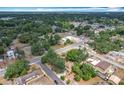 Expansive aerial view showcasing the neighborhood's lush green landscape at 713 W 3Rd St, Lakeland, FL 33805