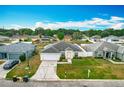 Spacious single-story home nestled in a quiet neighborhood with lush greenery at 1639 Saddlehorn Dr, Lakeland, FL 33810