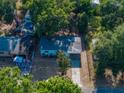 An aerial view of the home showcasing its layout, landscaping, and surrounding neighborhood at 1205 Crestwood Dr, Winter Haven, FL 33881