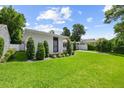 Well-manicured lawn and landscaping highlight this charming home's curb appeal at 1105 Chichester St, Orlando, FL 32803