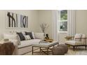 Cozy living room with stylish furniture, neutral tones, and natural light at 4759 Waltham Forest Dr, Davenport, FL 33837