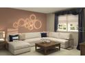 Comfortable living room featuring a plush sectional sofa, stylish decor, and a bright window with curtains at 2433 Spring Tune Aly, Kissimmee, FL 34744