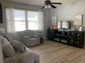 Comfortable living room featuring neutral paint, and an abundance of natural light at 2057 Swift Rd, Oviedo, FL 32766