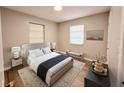Cozy bedroom featuring a plush bed, serene decor, and ample natural light at 2201 Flamingo Ave, Deltona, FL 32738