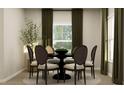 Cozy dining room with a round table, six chairs, and stylish curtains at 2879 Transformation Way, Clermont, FL 34714