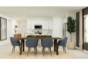 Open concept dining area with a wood table, six blue chairs, and ample natural light at 2109 Lasso Loop, Eagle Lake, FL 33839