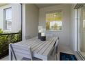 Cozy screened patio with table seating, perfect for outdoor dining at 3001 Namaste Dr, Clermont, FL 34714