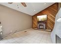 Living room features a fireplace, a TV, and neutral walls at 3807 Timberlake N Rd, Lakeland, FL 33810