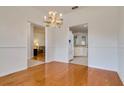Hardwood floor dining room offering views to the living room and kitchen at 2214 Deerbrook Dr, Lakeland, FL 33811