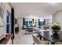Open-concept living room with dining area and kitchen; great for entertaining at 1748 Frogmore Ave, Haines City, FL 33844