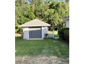 A single-car detached garage that offers additional storage space at 2528 Deerbrook Dr, Lakeland, FL 33811