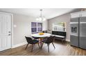 Cozy dining area featuring a round table and comfortable seating at 1002 Ne 1St St, Mulberry, FL 33860