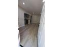 Inviting living space with new laminate flooring and recessed lighting provides a clean, modern look at 312 Dorothy Ave, Daytona Beach, FL 32117