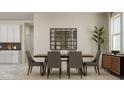 Dining room with a wooden table, six chairs, and a decorative mirror wall art at 5048 Barnet Dr, Davenport, FL 33837