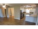 Modern kitchen featuring stainless steel appliances and granite countertops at 2414 Willow Oak Dr, Edgewater, FL 32141