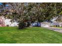 Charming single-Gathering home with a two-car garage and well-maintained lawn at 4526 Ficus Tree Rd, Kissimmee, FL 34758