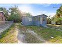 A quaint single-story home with a clean exterior and spacious yard at 1224 S Delaware Ave, Deland, FL 32720