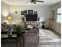 Comfortable living room with modern decor and a cozy seating area at 730 Barber Cir, Lakeland, FL 33803