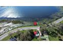 Aerial view of single-story home, located across from the lake at 1816 W Lake Parker Dr, Lakeland, FL 33805