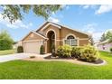 Attractive single-Gathering home with a manicured lawn and a neutral color scheme at 8360 Lake Amhurst Trl, Orlando, FL 32829