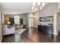 Elegant living room with stylish furnishings, high ceilings, and ample natural light at 8360 Lake Amhurst Trl, Orlando, FL 32829