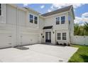 Beautiful exterior showcasing the home's curb appeal, including a two-car garage at 216 E Harding St, Orlando, FL 32806