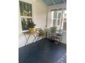 Cozy porch with seating area, plants, and natural light at 734 Maryland Ave, Winter Park, FL 32789
