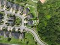 Aerial view of the neighborhood and the surrounding trees at 5095 Southlawn Ave, Orlando, FL 32811