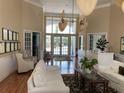 Bright lobby with elegant seating, high ceilings, and large windows providing ample natural light at 9053 Lee Vista Blvd # 1405, Orlando, FL 32829