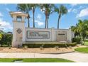 Community entrance sign with the Four Seasons at Orlando logo and decorative landscaping at 2132 Limestone Trl, Kissimmee, FL 34747