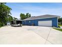Spacious garage and trailer parking, highlighting the expansive property at 3229 Gardner Oaks Ln, Lakeland, FL 33810
