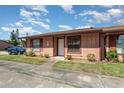 A cozy home boasting mature landscaping, shrubs, and a well manicured lawn at 89 Fremont Ave # 504, Daytona Beach, FL 32114