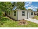 Charming home with a fresh exterior and a well-kept yard, perfect for suburban living at 833 N Suwannee Ave, Lakeland, FL 33815