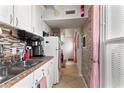 Efficient kitchen has an abundance of cabinet and countertop space, and all appliances at 4709 Club Cir, Lakeshore, FL 33854